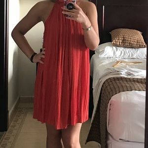Orange halter pleated dress